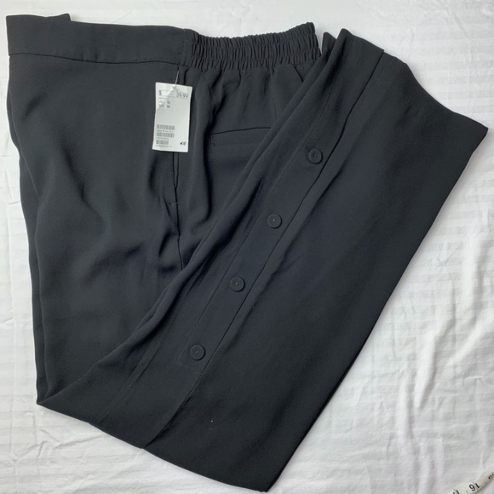 H&M women's black pants, buttons on side of leg, elastic back, 10, new with tags